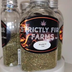 Grinded buds in a flask